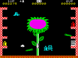 Pssst on the ZX Spectrum: a large flower in the middle of the screen, with bugs crawling toward it and spray cans on brick ledges at either side